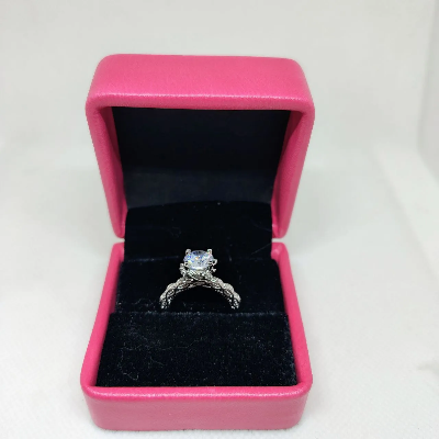 Picture of Luminous Embrace  Brilliant Center Stone with Twisted Band Womens Ring