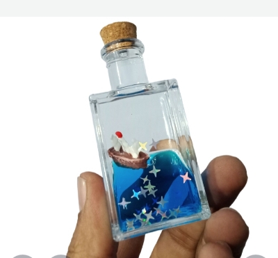 Picture of Acrylic Desktop Decoration Black Liquid Wave Pirate Cruise Ship Fluid Drift Bottle Relaxing Toy Drifting Bottle Floating Boat Ornament Decompression Toy Birthday Gift Home Desktop - Blue
