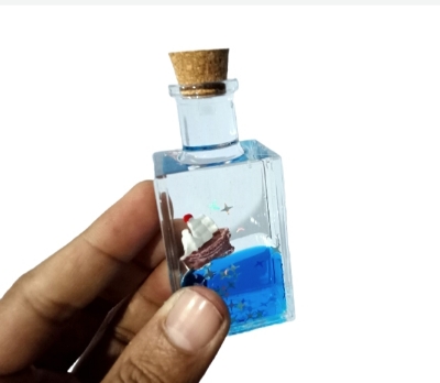 Picture of Acrylic Desktop Decoration Black Liquid Wave Pirate Cruise Ship Fluid Drift Bottle Relaxing Toy Drifting Bottle Floating Boat Ornament Decompression Toy Birthday Gift Home Desktop - Blue