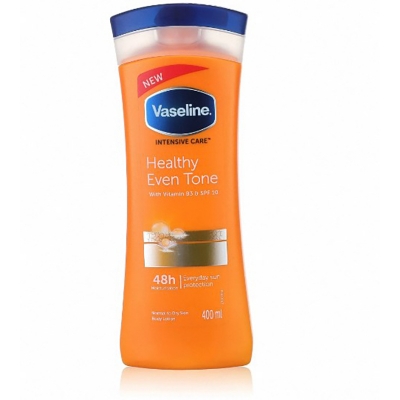 Picture of Any season used International South African Product Vaseline Lotion healthy even tone yellow color for male / female - 400 ml