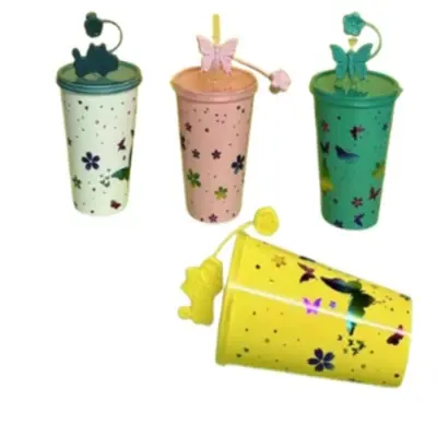 Picture of Plastic tumbler with a lid and straw, featuring a floral and butterfly design 700 ml
