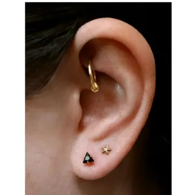 Picture of tiny crystal triangle earrings | black Nose pin