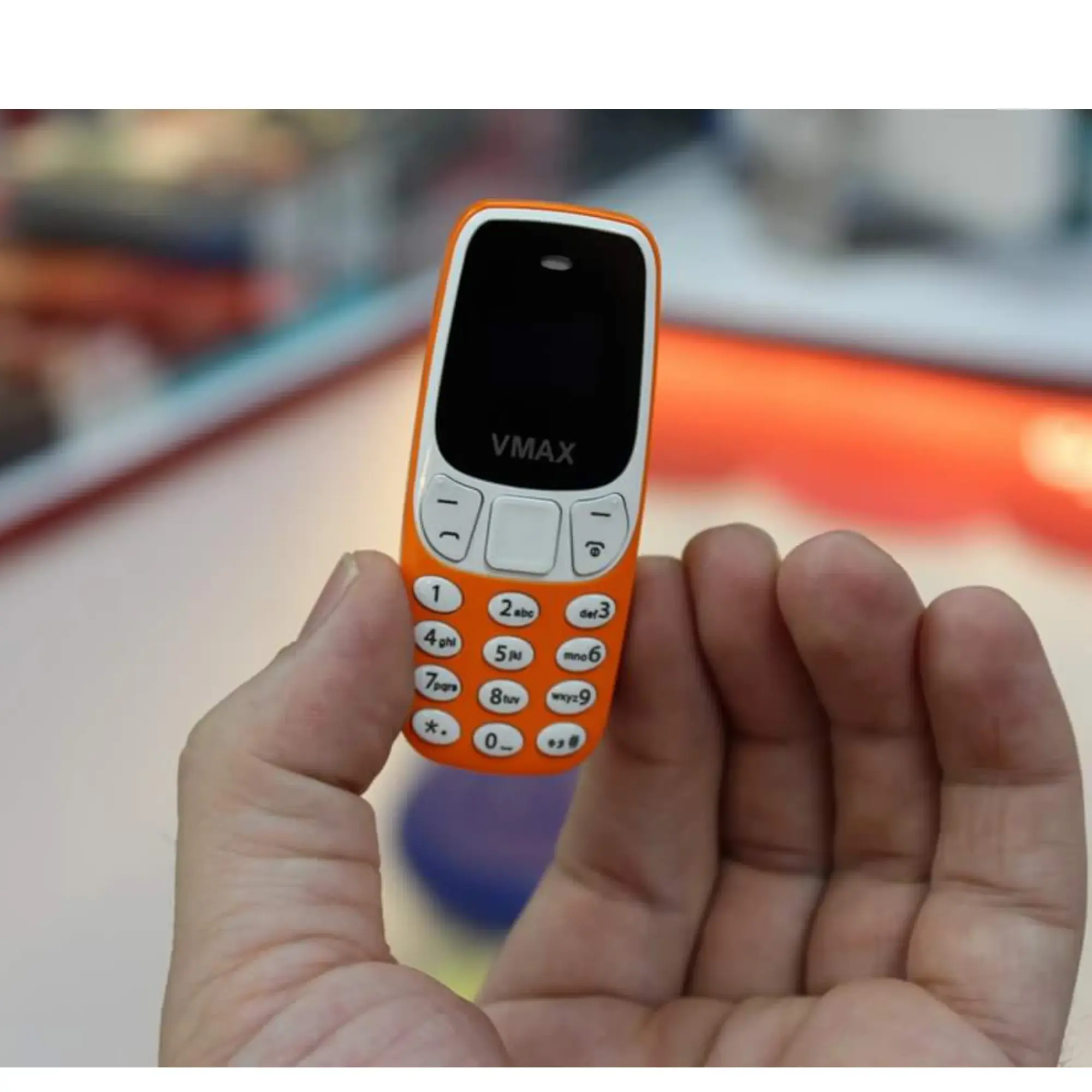 Picture of Vmax V51 Mini Phone Magic Voice(Orange)