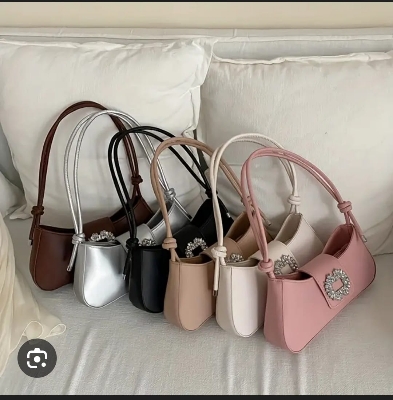 Picture of Trendy Knot Handle Stone Boat Shape Shoulder Bag