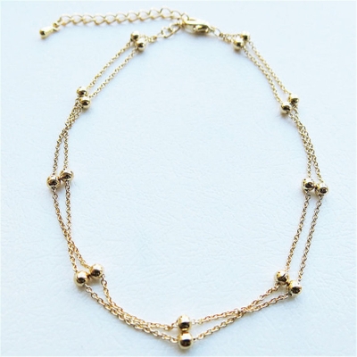 Picture of Stylish Multilayer Golden Colored Anklet for Women | Simple Design Foot Chain - Gold