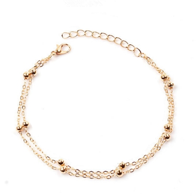 Picture of Stylish Multilayer Golden Colored Anklet for Women | Simple Design Foot Chain - Gold