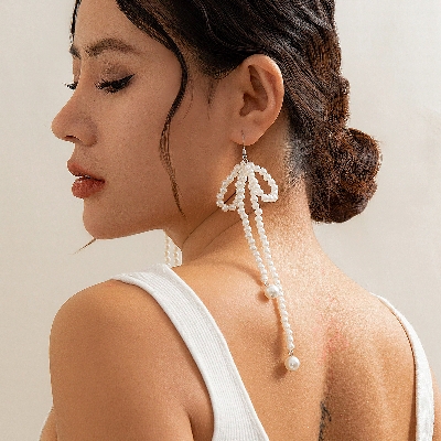 Picture of Elegant Imitation Pearl Bowknot Drop Earrings Korean Beaded Long Tassel Earrings Women's Wedding Bride Jewelry Tenoor Special - Multi