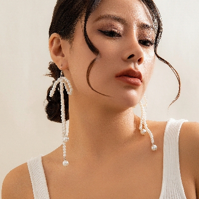 Picture of Elegant Imitation Pearl Bowknot Drop Earrings Korean Beaded Long Tassel Earrings Women's Wedding Bride Jewelry Tenoor Special - Multi