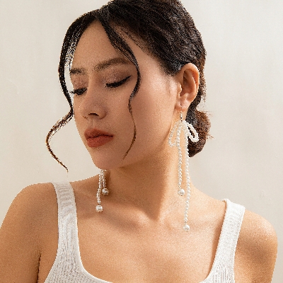 Picture of Elegant Imitation Pearl Bowknot Drop Earrings Korean Beaded Long Tassel Earrings Women's Wedding Bride Jewelry Tenoor Special - Multi