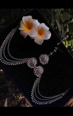 Picture of Gorgeous party wear antique silver necklace and earring set for girls and woman. - Green