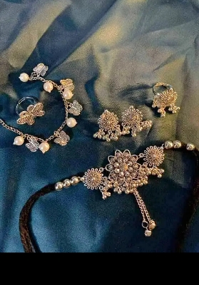 Picture of Gorgeous party wear antique silver necklace and earring set for girls and woman. - Silver