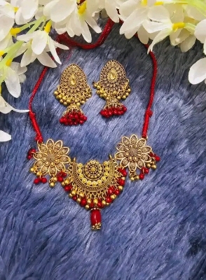 Picture of Gorgeous party wear antique Golden necklace and earring set for girls and woman. - Gold