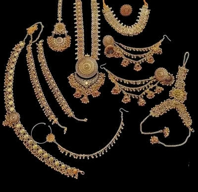 Picture of Gorgeous party wear antique Golden necklace and earring set for girls and woman. - Gold