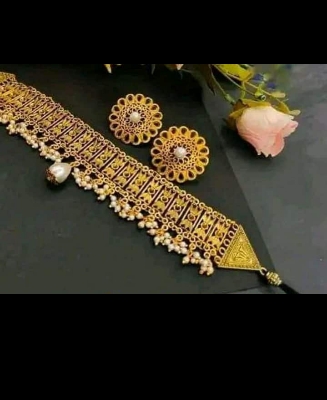 Picture of Gorgeous party wear antique golden necklace and earring set for girls and woman. - Gold