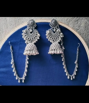 Picture of Gorgeous party wear antique silver necklace and earring set for girls and woman. - Silver