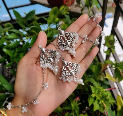 Picture of Gorgeous party wear antique silver necklace and earring set for girls and woman - Silver