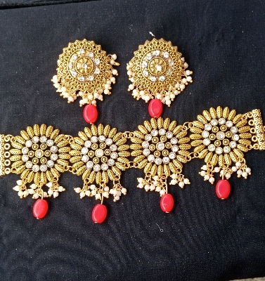 Picture of Gorgeous party wear antique golden necklace and earring set for girls and woman. - Gold
