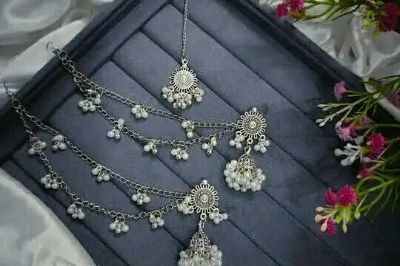 Picture of Gorgeous party wear antique silver necklace and earring set for girls and woman. - Silver