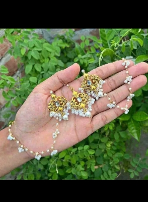 Picture of Gorgeous party wear antique golden necklace and earring set for girls and woman. - Gold