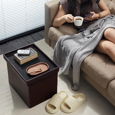 Picture of AmasSmile Storage Ottoman Folding Foot Rest Stool, Leather Footstool Bench, Short Ottoman Stool, Storage Foot Rest Store, Books (17" D x 13" W x 13" H)
