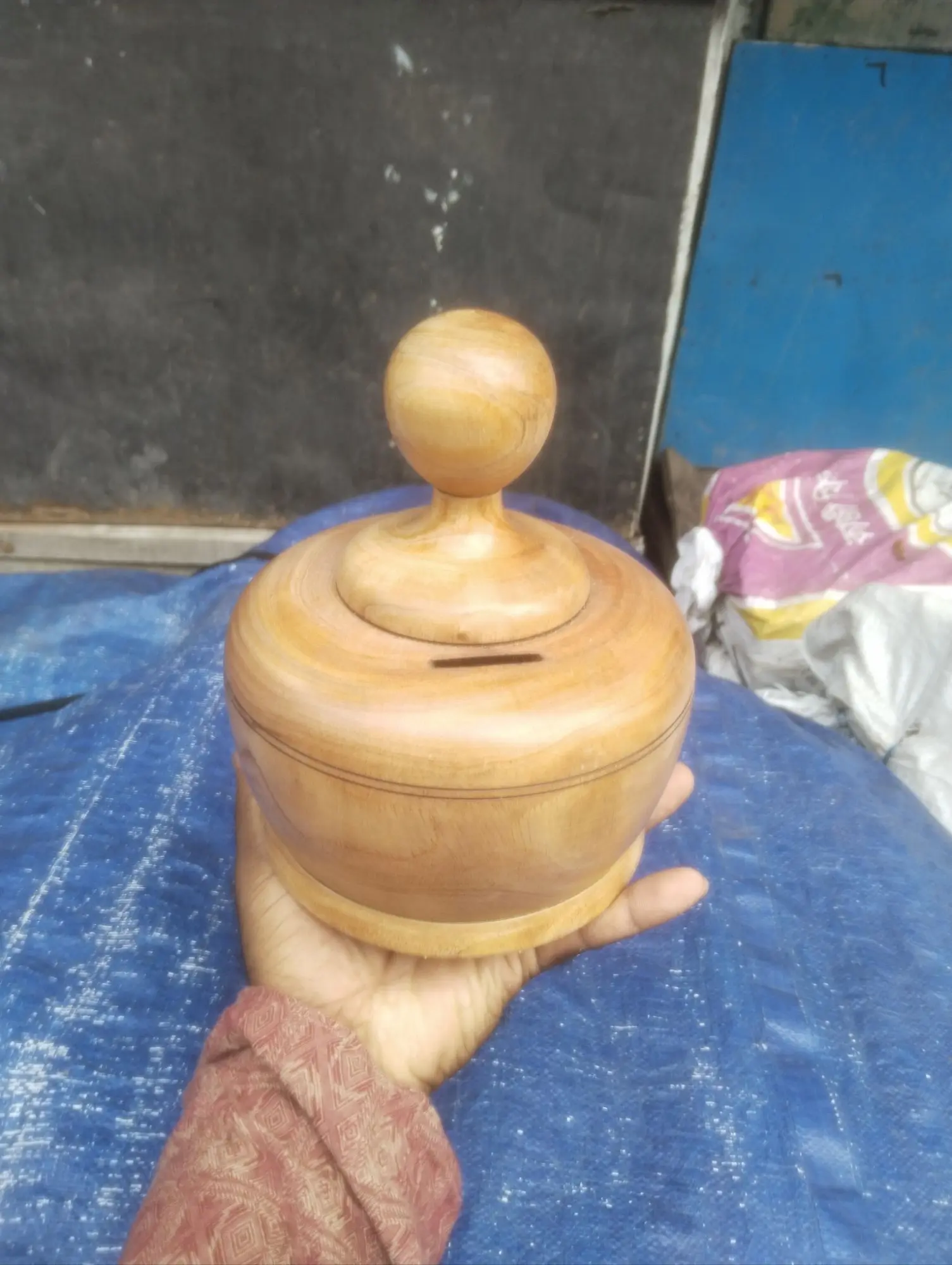Picture of wooden money bank for saving money - Multicolor