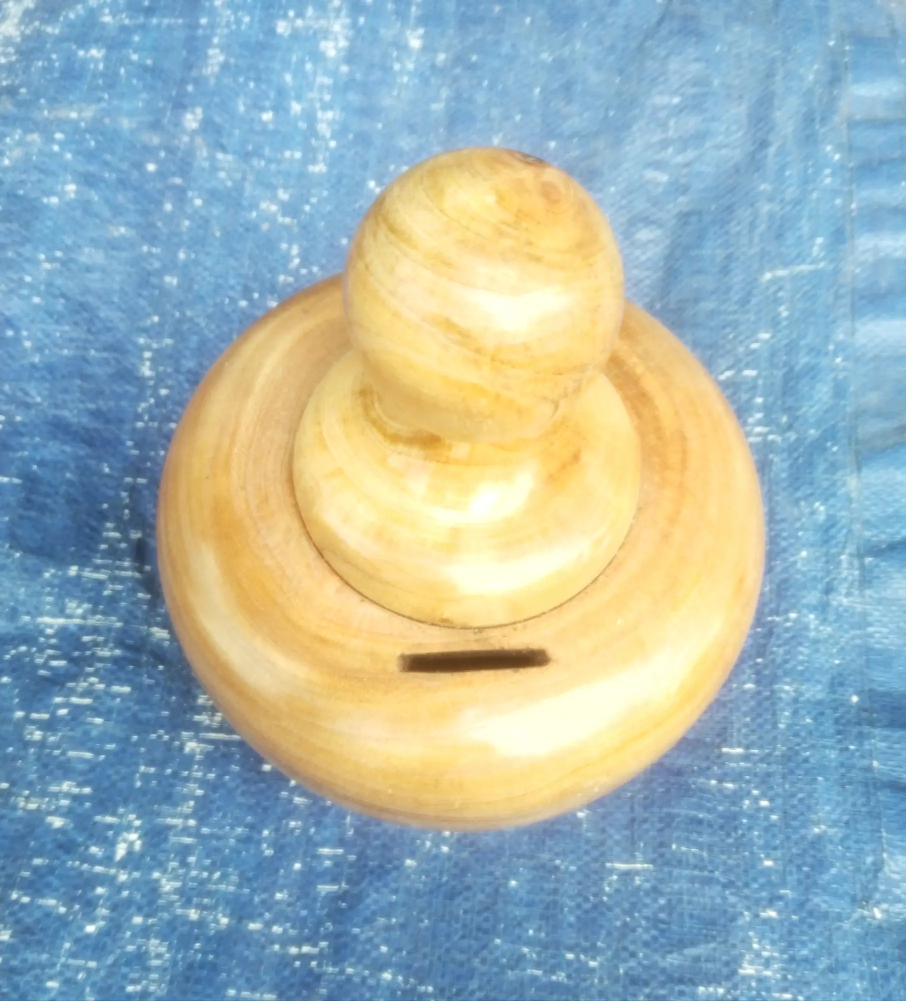 Picture of wooden money bank for saving money - Multicolor