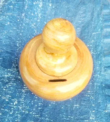 Picture of wooden money bank for saving money - Multicolor