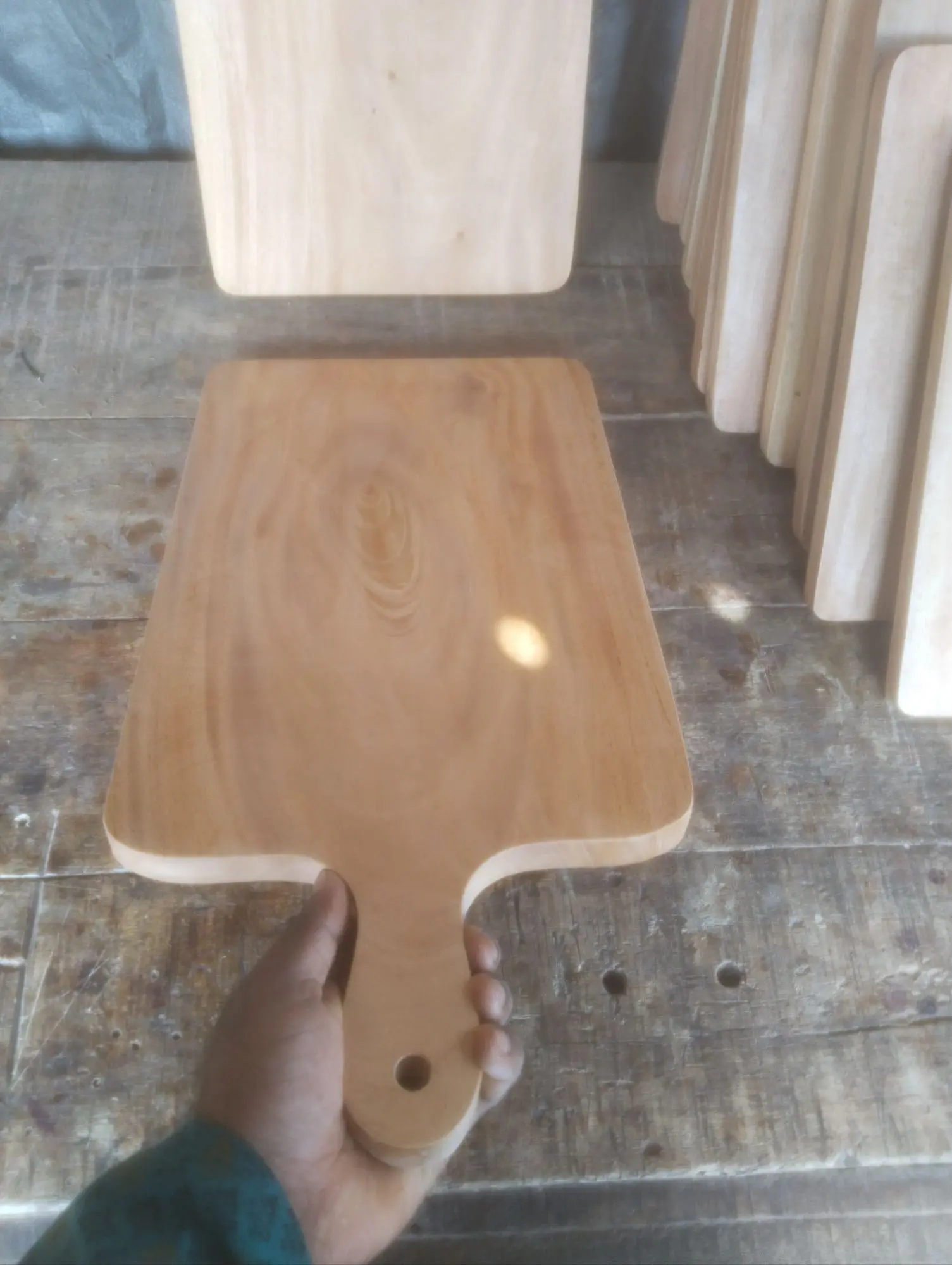 Picture of high quality wooden big size chopping board with handle (10inch by 20 inch ) - Multicolor