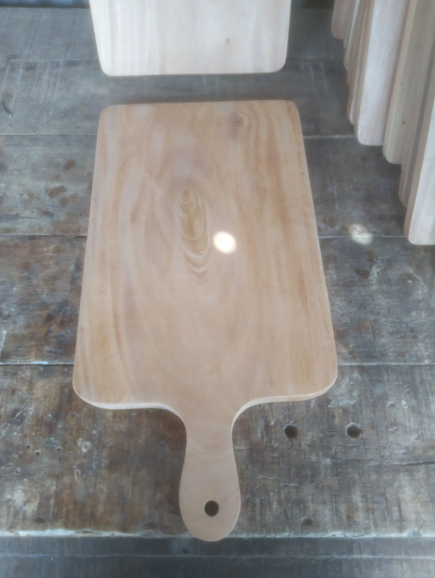 Picture of high quality wooden big size chopping board with handle (10inch by 20 inch ) - Multicolor