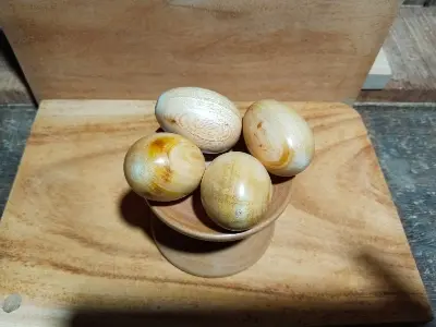 Picture of Wooden baby toys set  , wooden small  egg set - Showpiece ( 4 pieces egg with stand ) - Multicolor