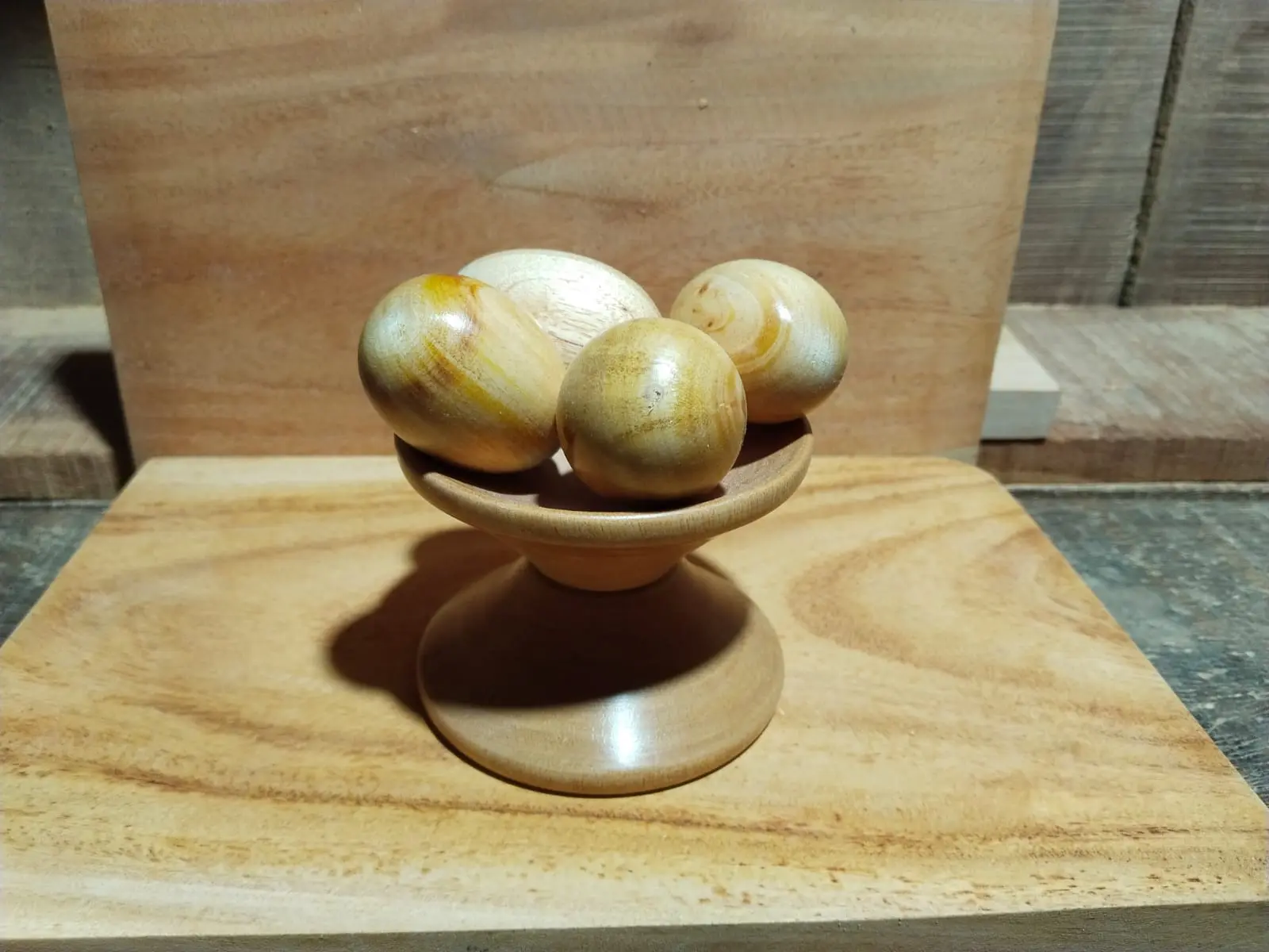 Picture of Wooden baby toys set  , wooden small  egg set - Showpiece ( 4 pieces egg with stand ) - Multicolor