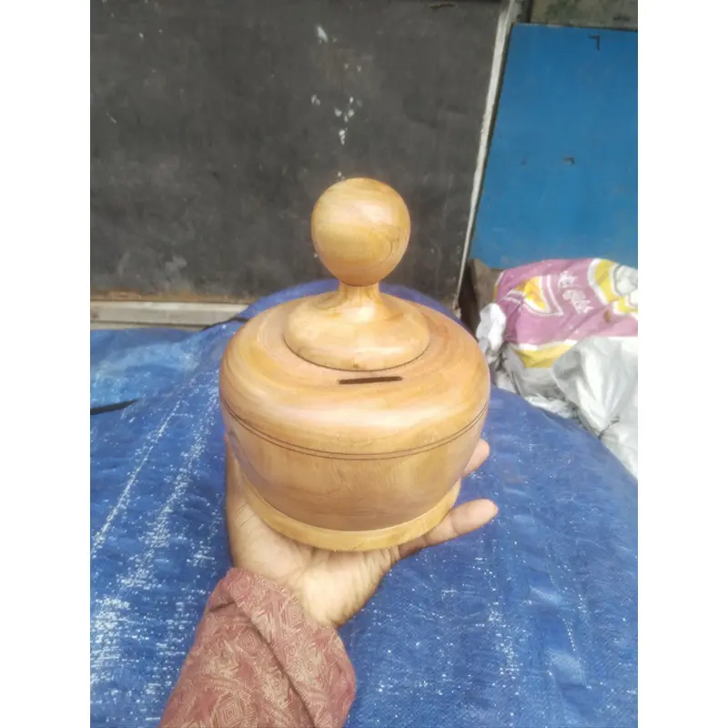 Picture of wooden money bank for saving money - Multicolor