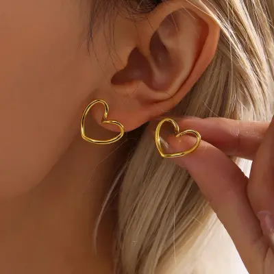 Picture of Eternal Fluid Heart Stud Earrings | 1 Years Color Guaranteed Golden