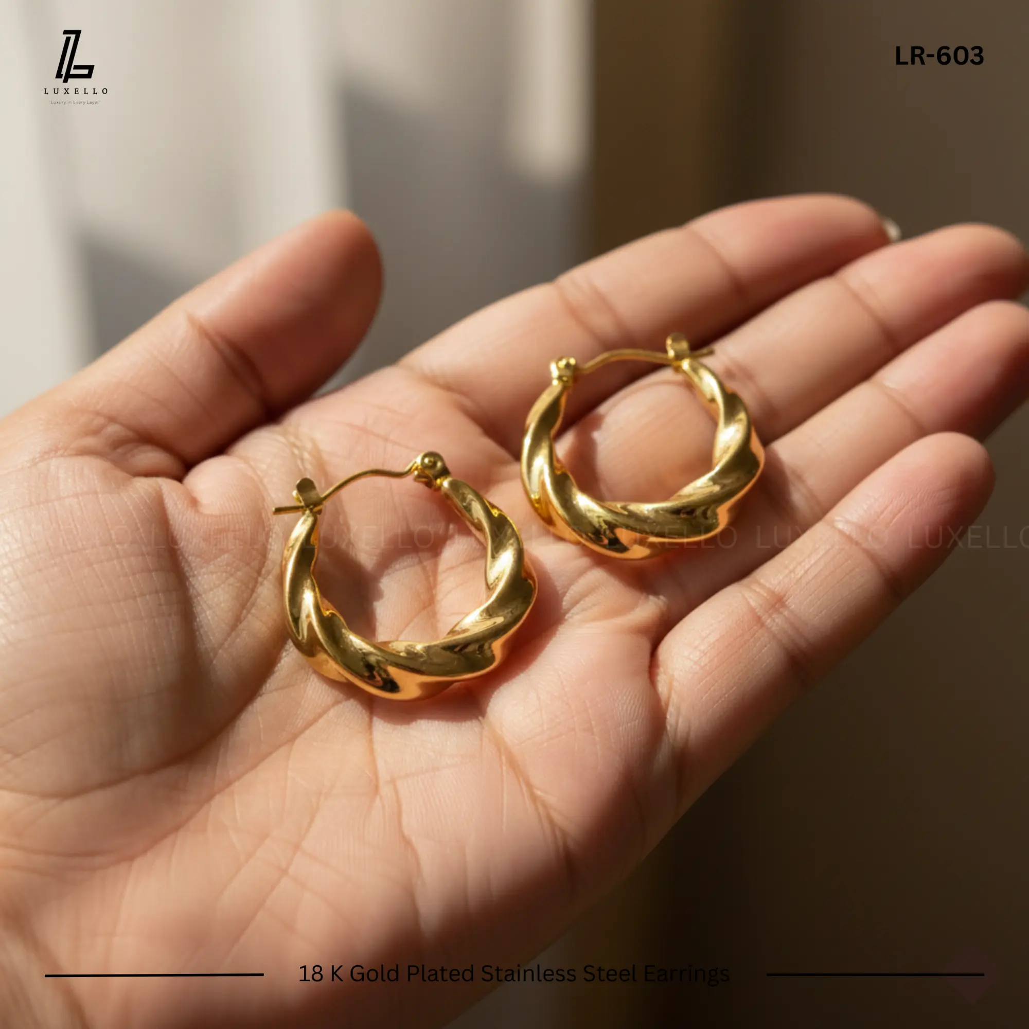 Picture of Twisted Croissant Gold Hoop Earrings | 1 Years Color Guaranteed Golden