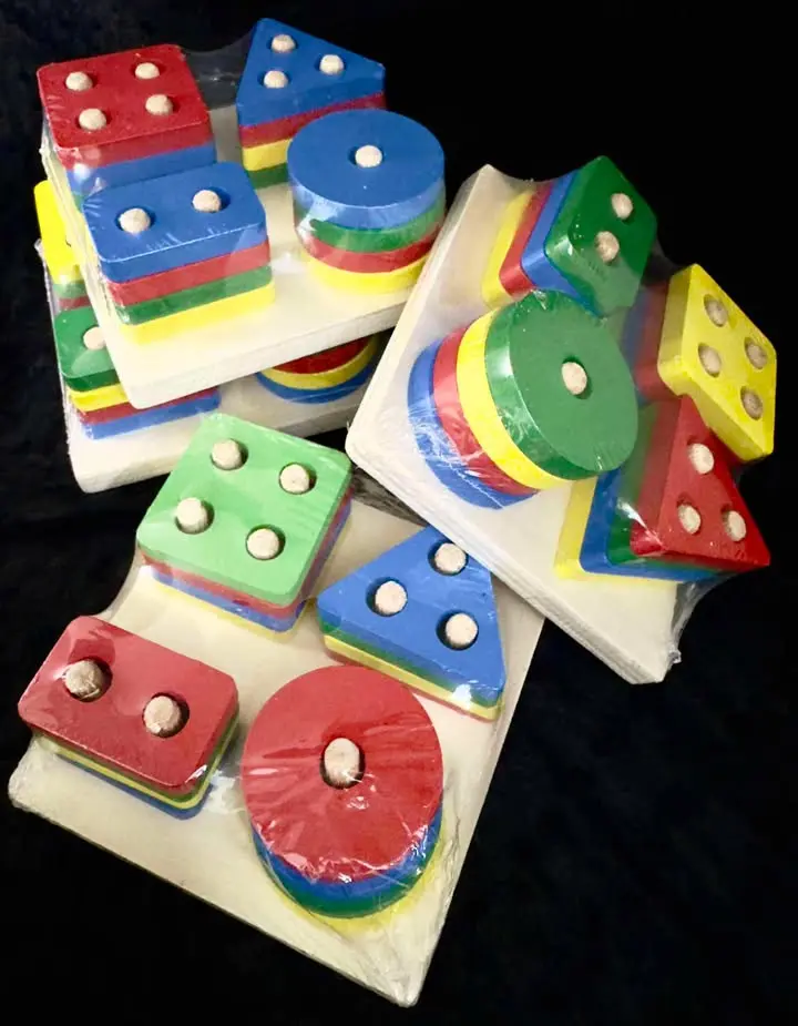 Picture of Wooden Stacking Toys & Shape Sorting Board - Geometric Shape Stacker
