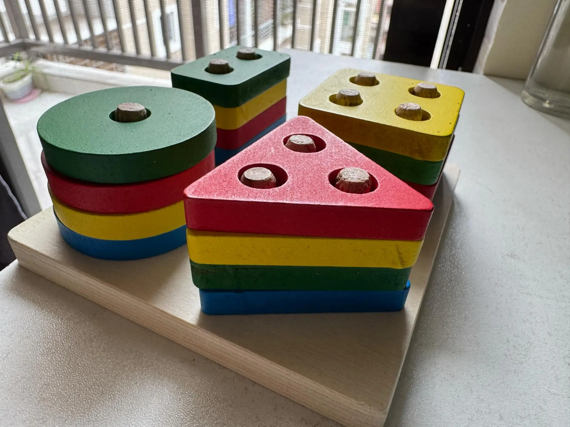 Picture of Wooden Stacking Toys & Shape Sorting Board - Geometric Shape Stacker