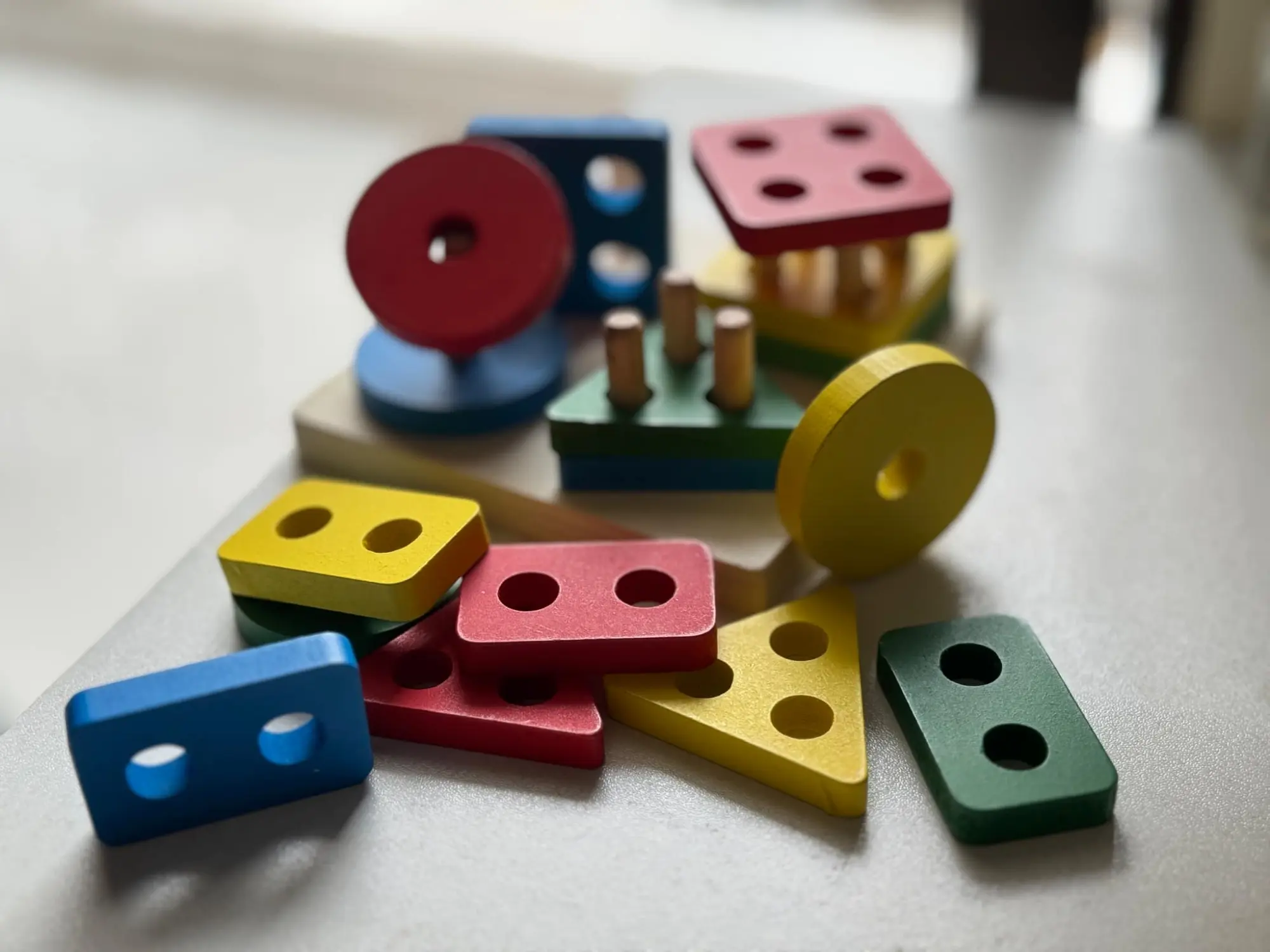 Picture of Wooden Stacking Toys & Shape Sorting Board - Geometric Shape Stacker