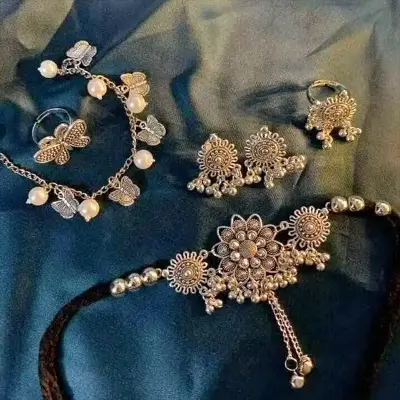 Picture of Gorgeous party wear antique silver necklace and earring set for girls and woman. - Silver