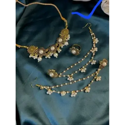 Picture of Gorgeous party wear antique golden necklace and earring set for girls and woman. - Gold