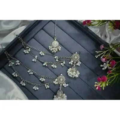 Picture of Gorgeous party wear antique silver necklace and earring set for girls and woman. - Silver