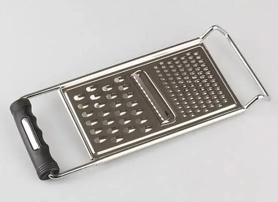 Picture of Fruit planer and Slicer / Stainless Steel with plastic grip Hand Greater Multifunctional Vegetables & Fruits Slicer - Silver