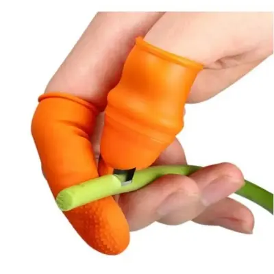 Picture of Silicone Vegetable And Fruits Thumb Cutter Finger cutter 5 in 1 - Orange