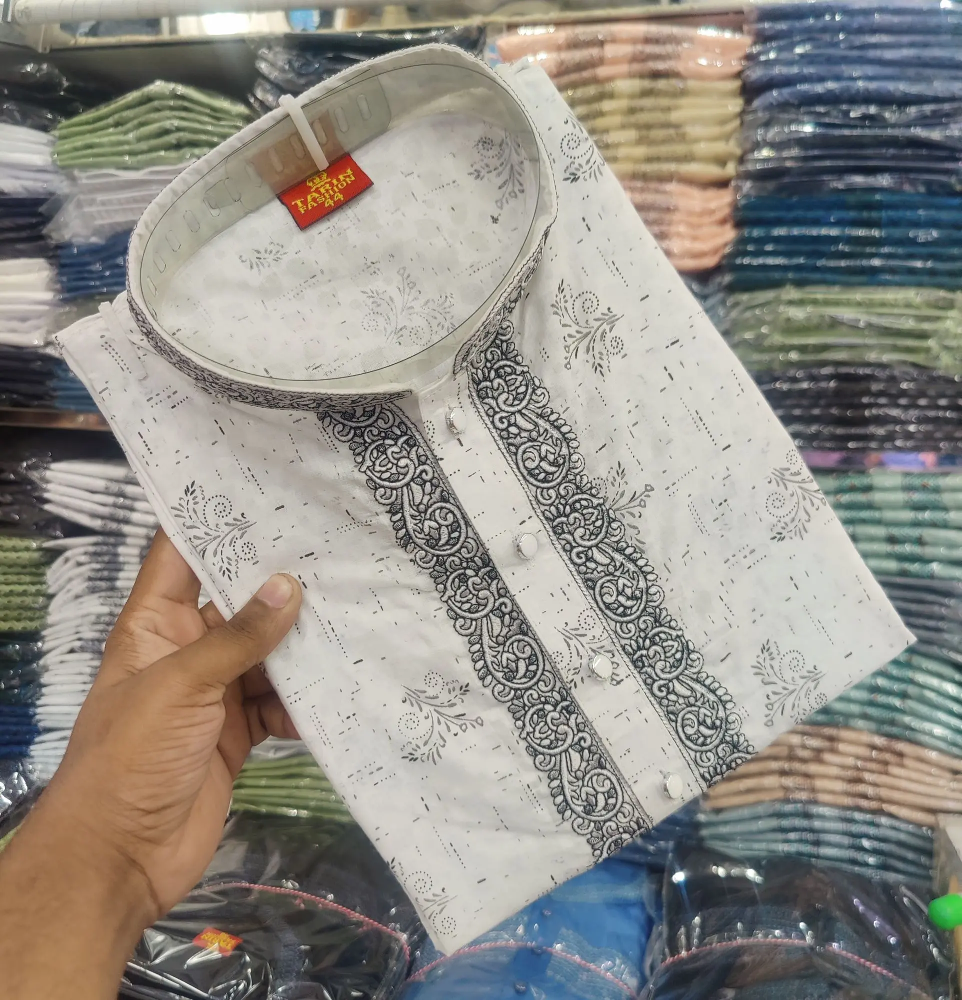 Picture of Sada colour pure suti kaporer notun design er panjabi