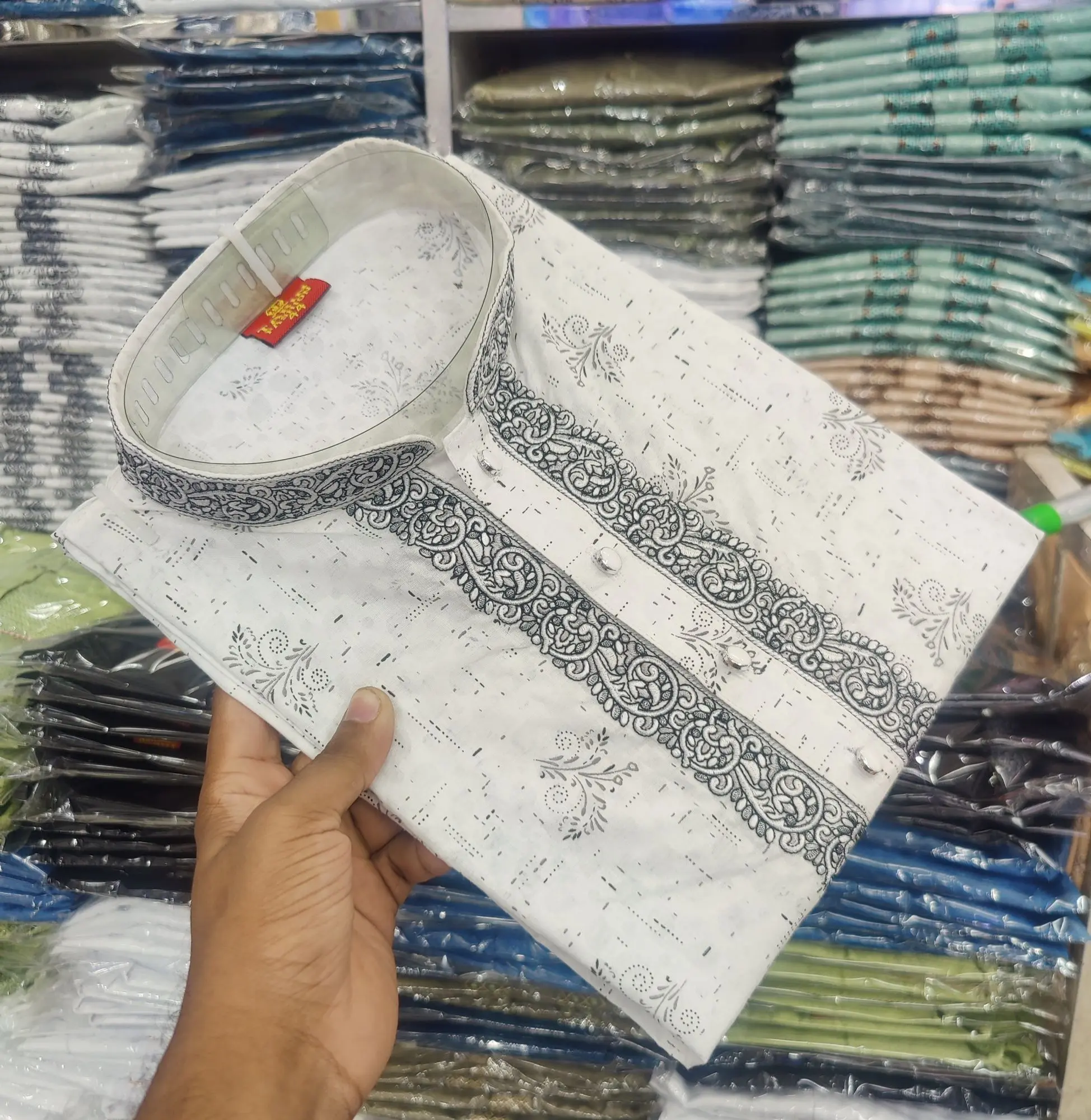 Picture of Sada colour pure suti kaporer notun design er panjabi