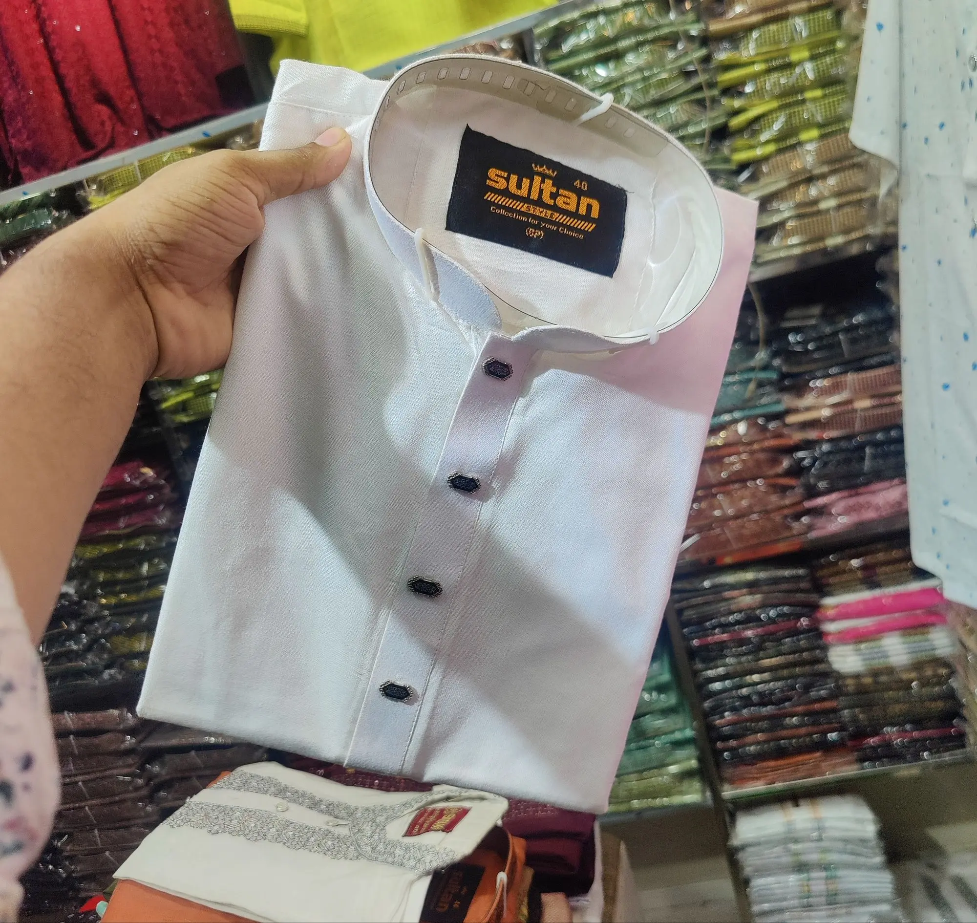 Picture of white colour high quality febric snap button panjabi