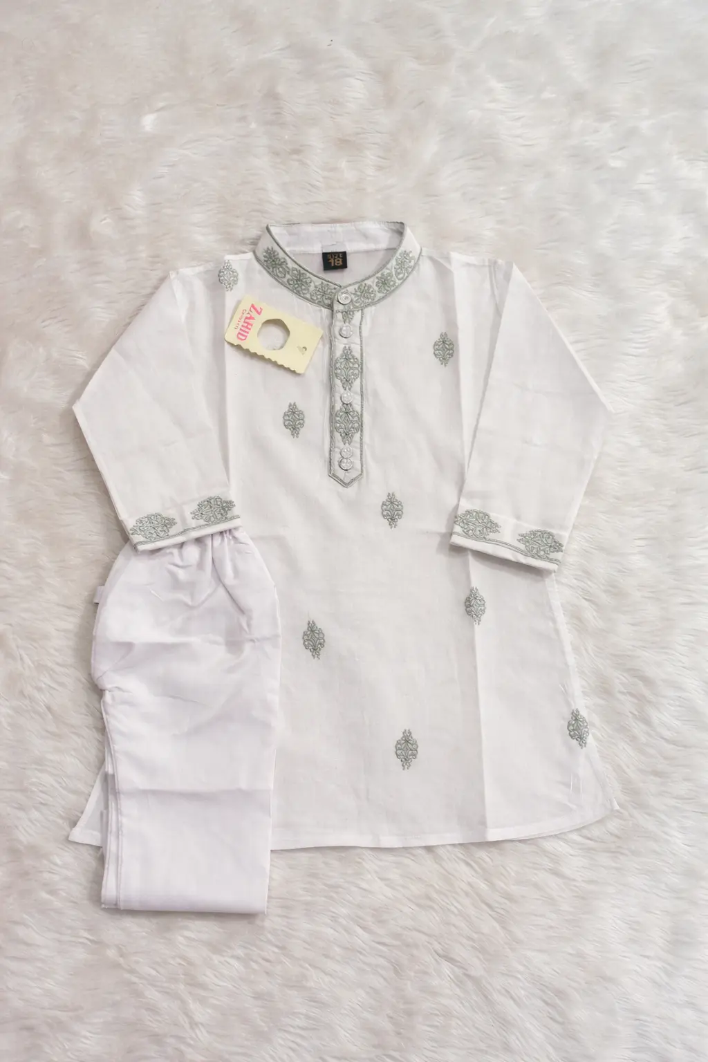 Picture of new bron baby dhuti febric pure cotton full body ambrodary work white colour panjabi
