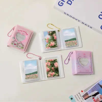 Picture of Cute Love Hollow Photo Album Mini PVC Small Card Storage Album with Pendant Cartoon Collect Book Album Decorative