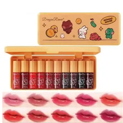 Picture of lip glosses or liquid lipsticks packaged in a yellow case.