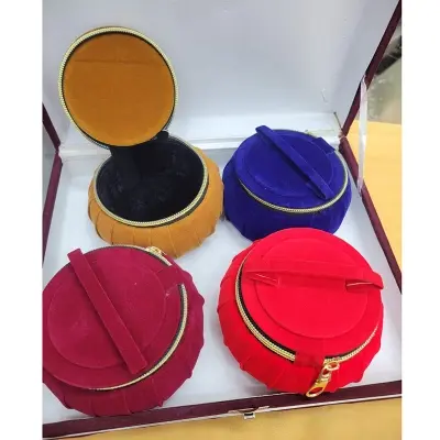 Picture of To make a fabric-covered jewelry box similar to those pictured, you can follow these general steps, often involving a base structure like cardboard or a book, and then covering it with fabric. 