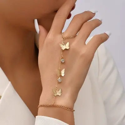 Picture of Exclusive Golden Stylish Bracelet Fashion Hand Finger Ring Types Bracelet Women